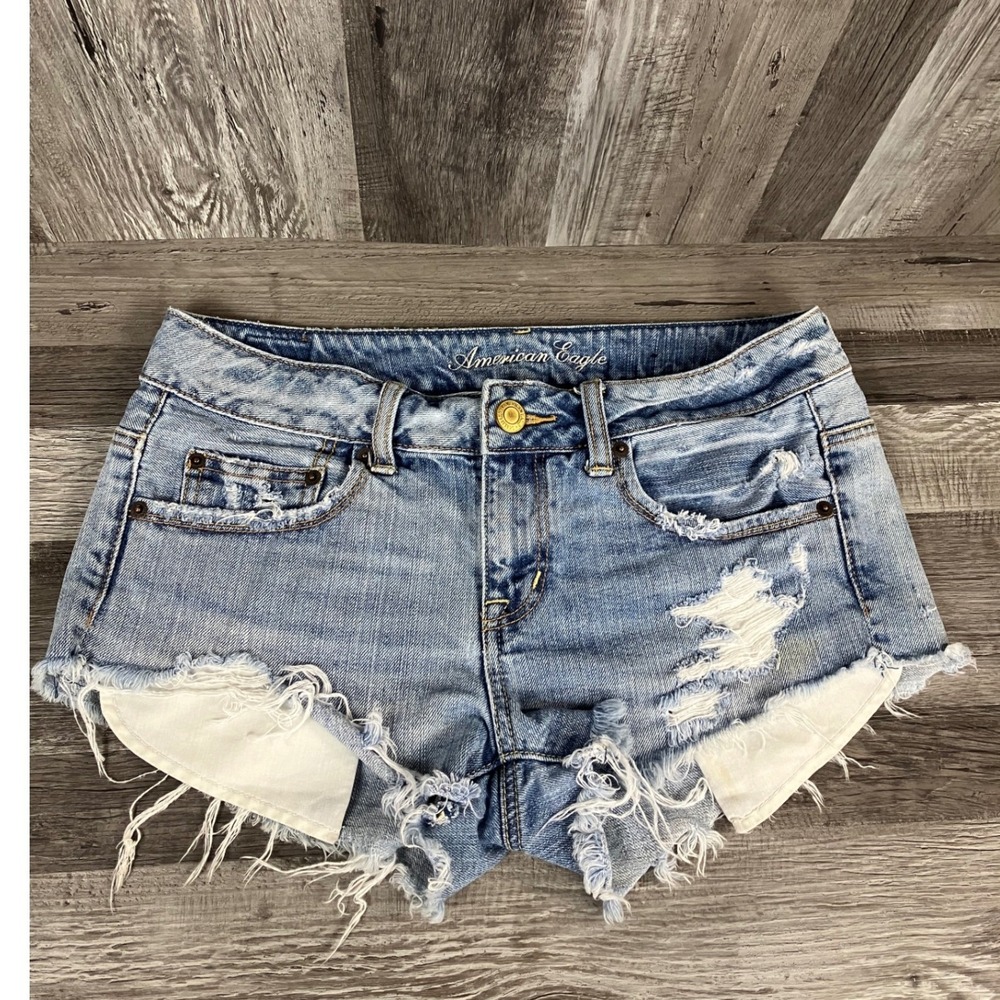 American Eagle Womens Distressed Denim Shorts Size 4 Light Wash Raw Hem Cutoffs